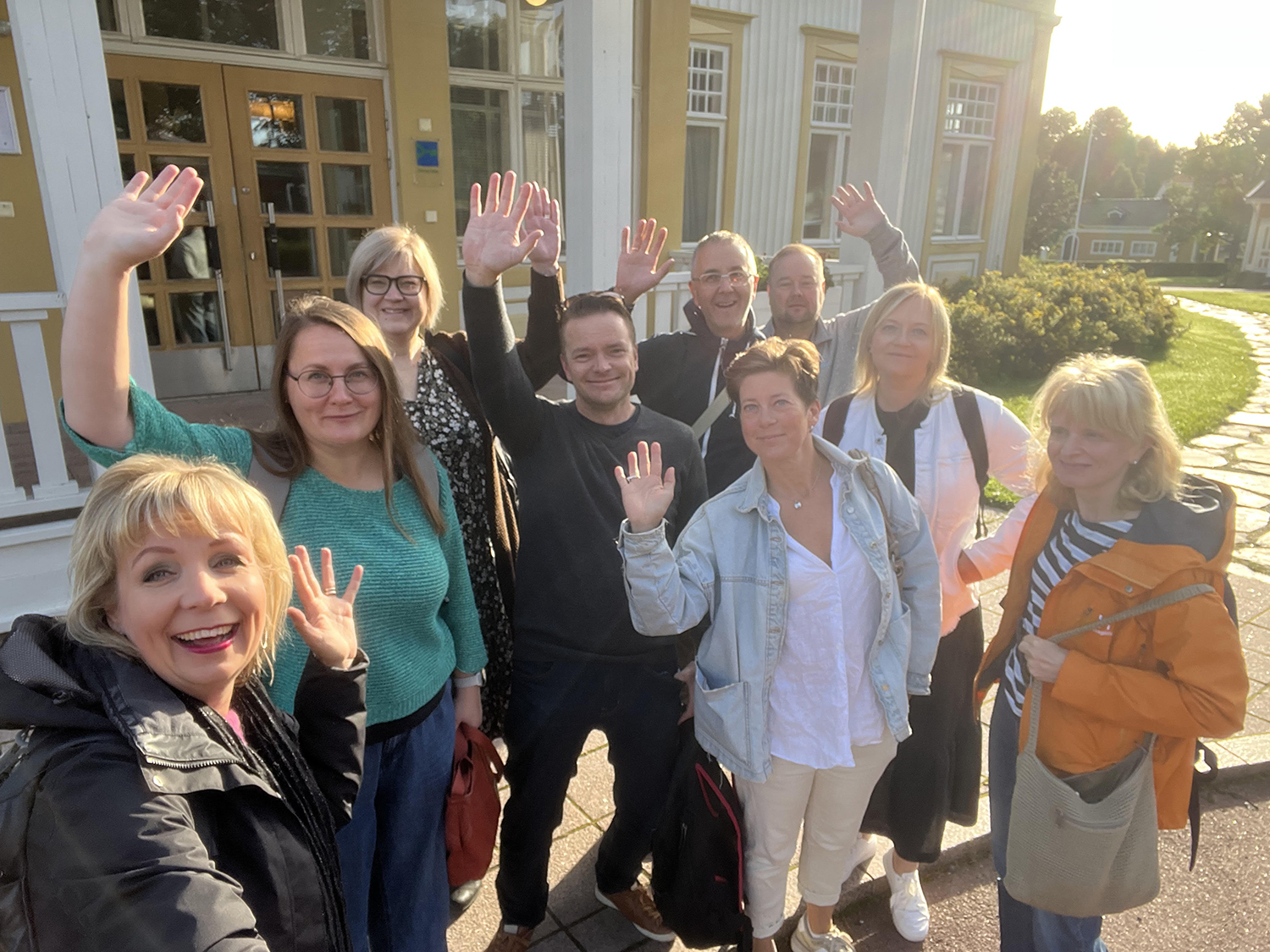 Ce4Re Team1 Ce4Re project team members waving in a group photo.
